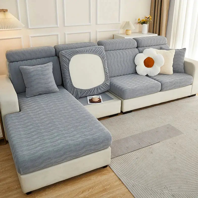 Gray jacquard sofa seat cover with elasticized edges and white square cutout showing back side decorbites sofa cover