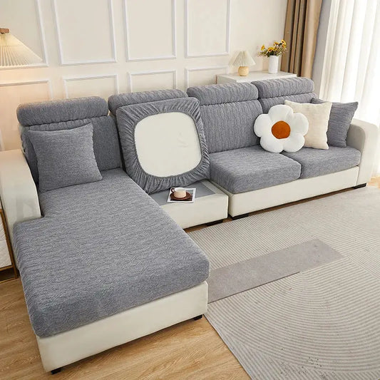 Gray jacquard sofa seat cover with elasticized edges and white square cutout at backrest decorbites sofa cover