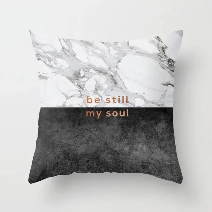 Square throw pillow case with gray marble top half, black agate textured lower half and rose gold lettering for living room decor
