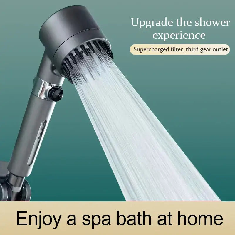 Gray metallic handheld shower head with sleek cylindrical design and multiple spray nozzles for bathroom use