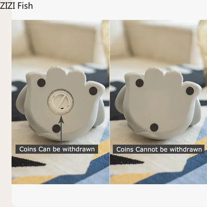 White silicone fish-shaped savings jar piggy with black feet and rotating dial for coin dispensing in nursery decor
