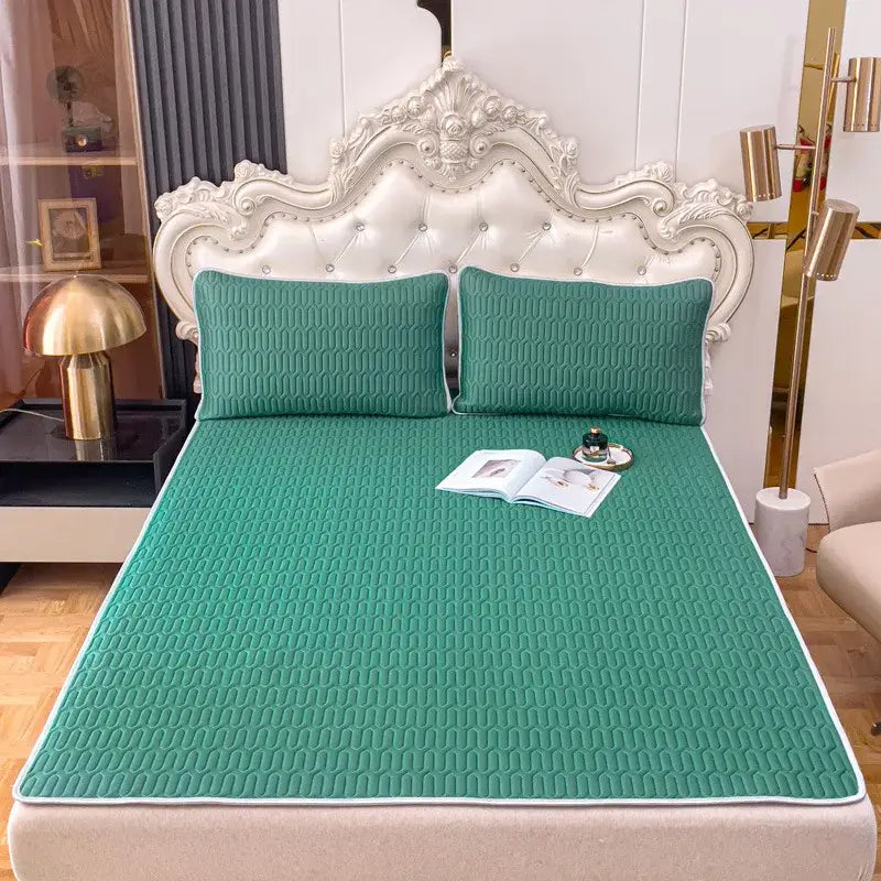 Emerald green quilted cooling mattress pad with white piping part of decorbites cooling latex summer mat set