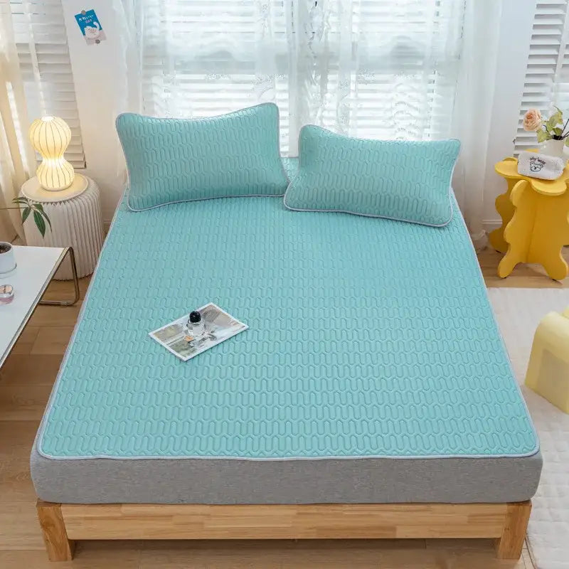 Light blue quilted mattress pad with gray border in decorbites cooling latex summer mat set for bedroom use