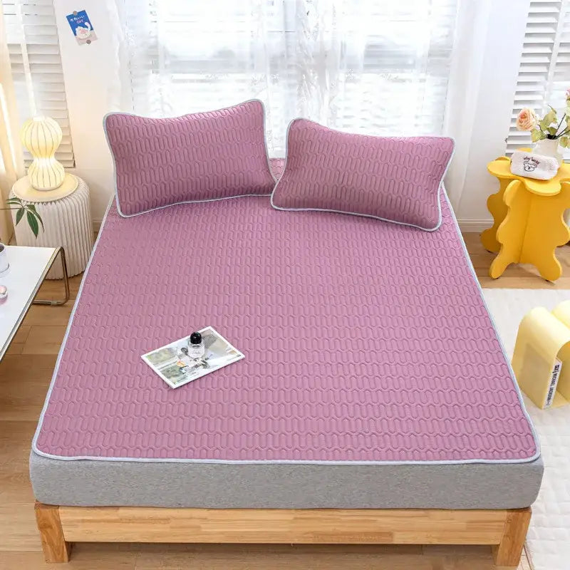 Pink quilted bed pad with gray trim from decorbites cooling latex summer mat set for bedroom use