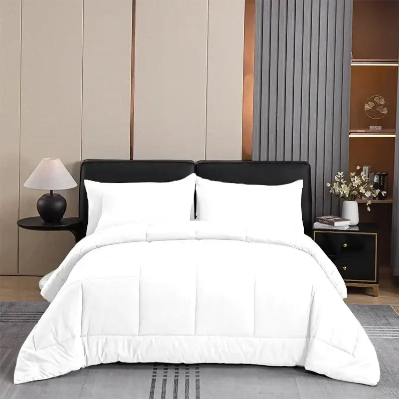 White quilted king size comforter with soft plush texture and clean modern design ideal for bedroom use