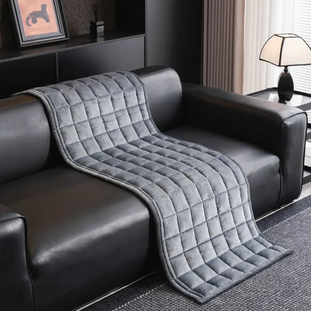 Gray quilted sofa towel with soft plush texture and stitched diamond pattern for living room cushion pads