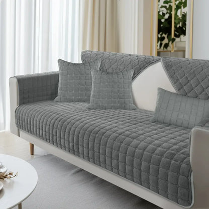 Gray quilted velvet plaid sofa cover featuring diamond-stitched pattern and soft plush texture for living room furniture protection