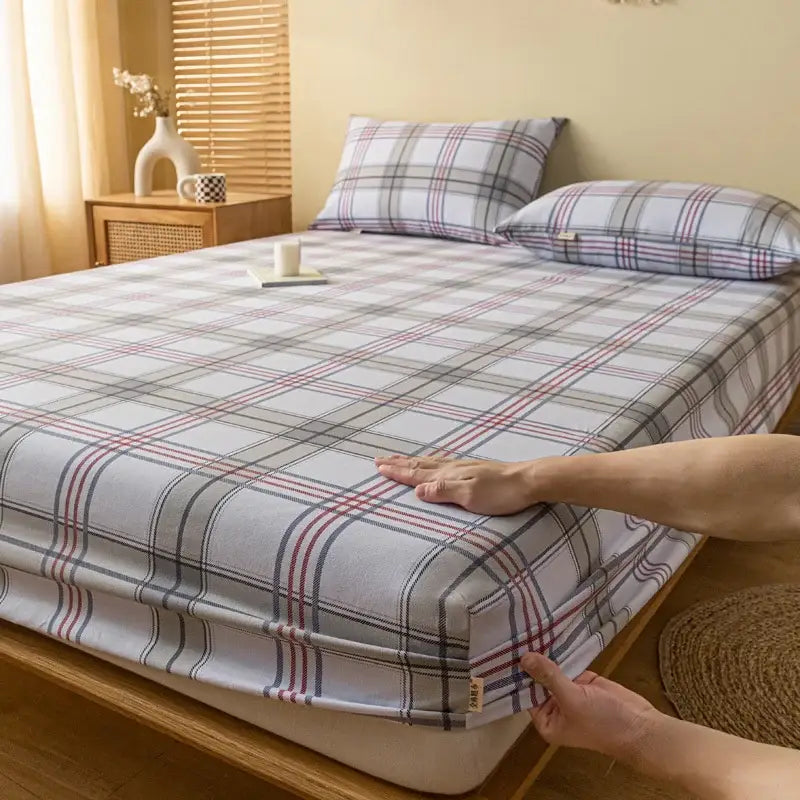 Gray red and black plaid cotton sheet set featuring a soft fitted sheet with decorbites coarse cloth texture