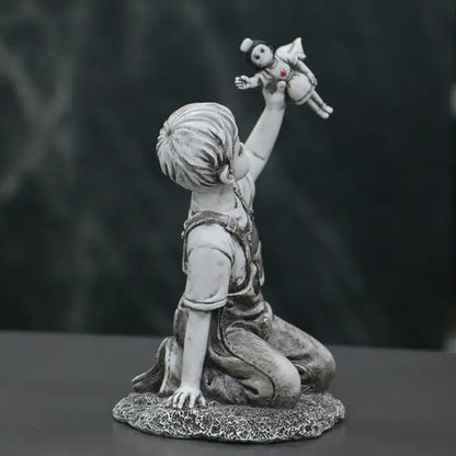 Gray resin super nurse angel boy statue kneeling with overalls holding small angel doll for living room decor