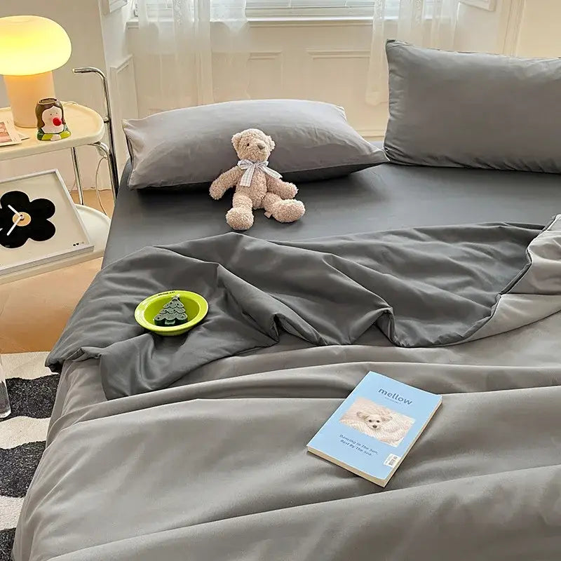 Gray satin cotton quilted duvet cover with smooth reflective surface and soft folds for bedroom bedding decorbites set