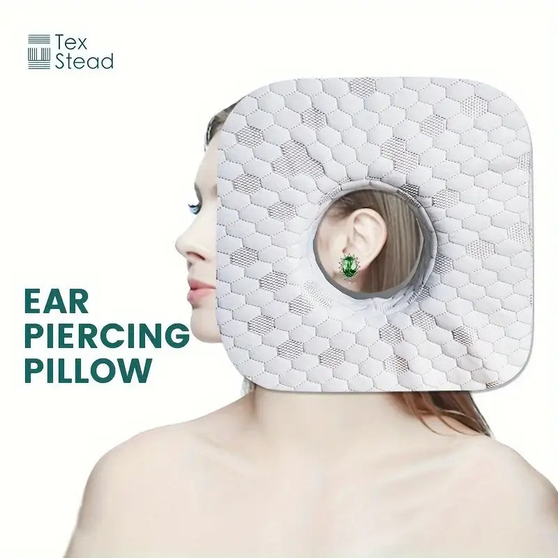 Gray textured decorbites comfort ear guard pillow with white hexagonal pattern and circular relief hole for ear pain