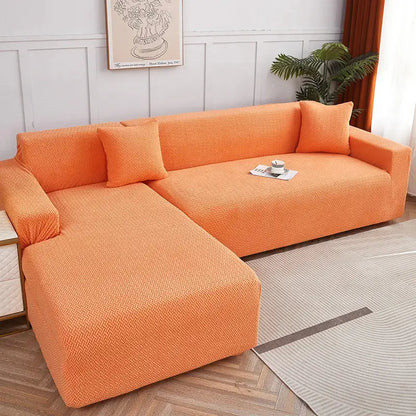 Bright orange stretchy fabric sofa cover with textured herringbone pattern for decorbites jacquard sofa cover use