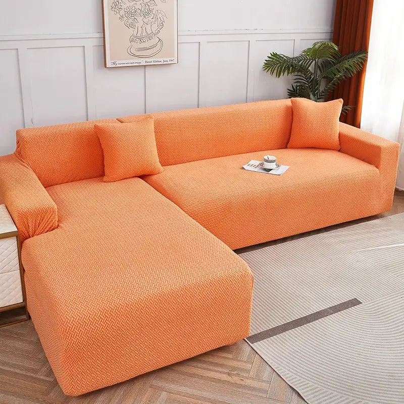 Bright orange stretchy fabric sofa cover with textured herringbone pattern for decorbites jacquard sofa cover use