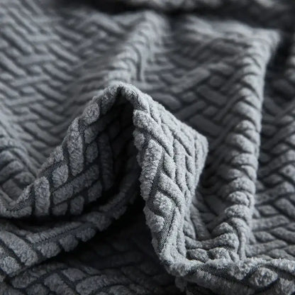 Gray textured jacquard sofa cover with raised woven braided pattern by decorbites for living room decor