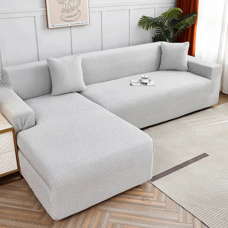 Light gray textured jacquard sofa cover with matching pillows for living room by decorbites jacquard sofa cover