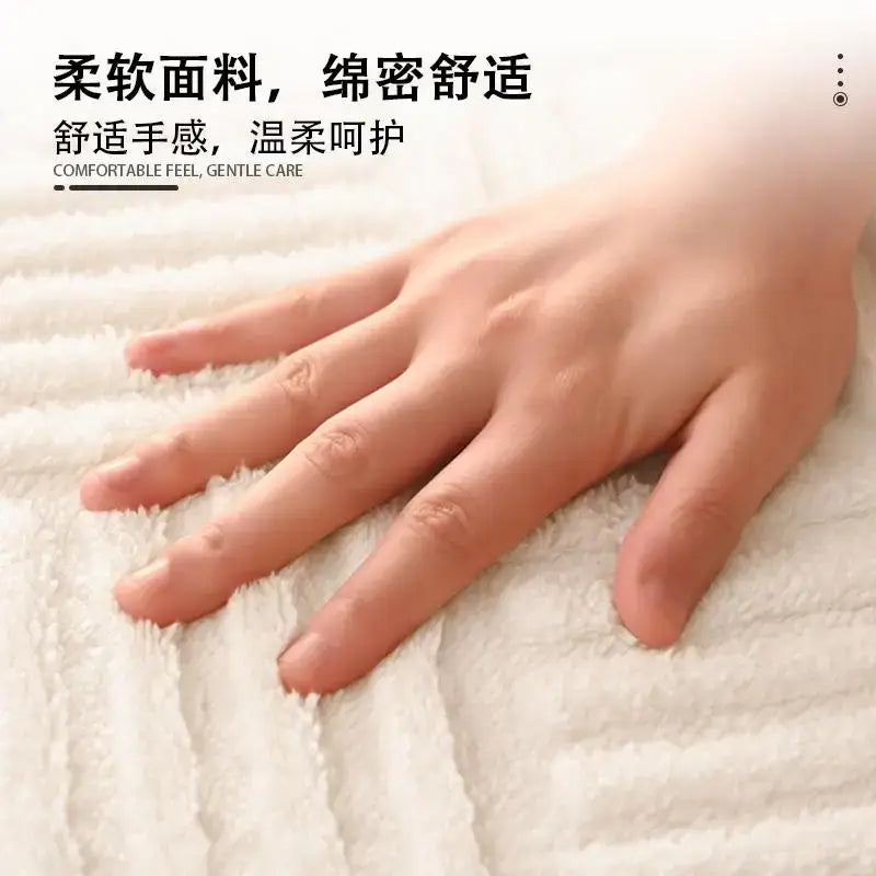 A hand resting on a gray textured striped floor mat made of plush fabric non slip bathroom carpet