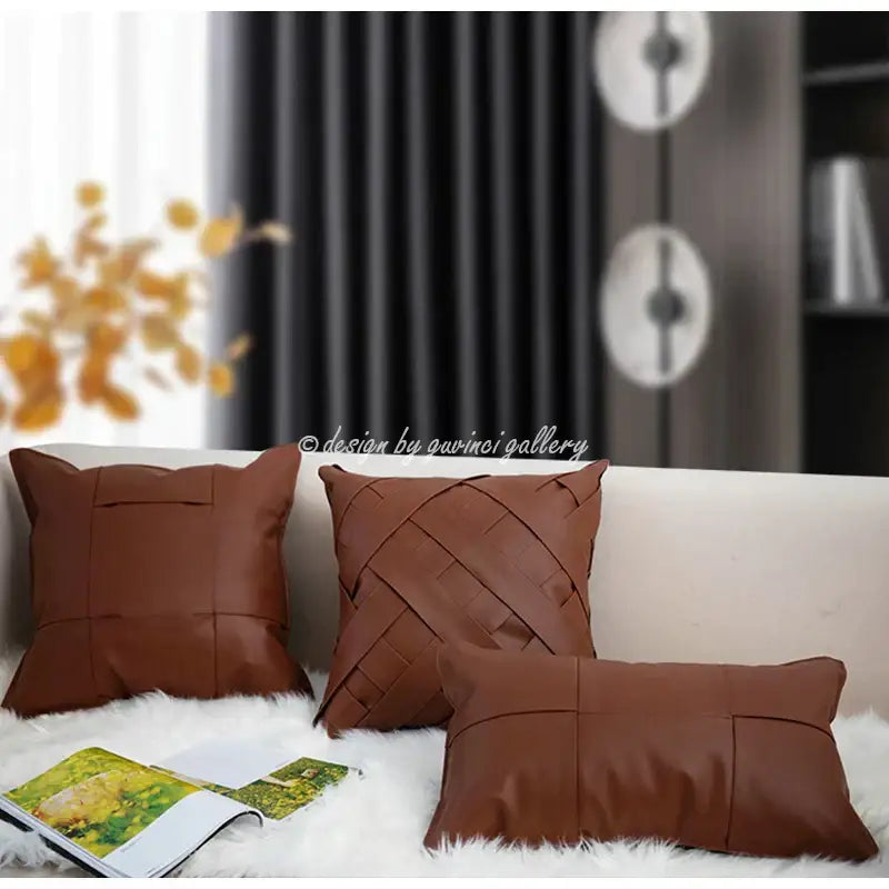 Set of three brown leather throw pillows with woven stitched designs paired with decorbites gray faux rex rabbit fur cushion cover
