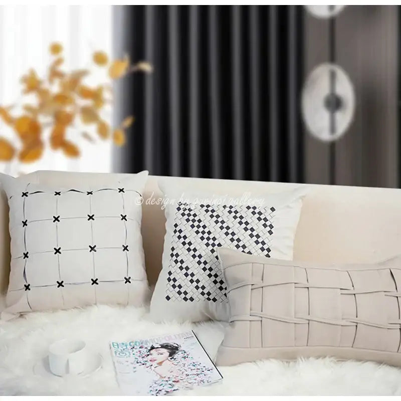 Three decorative gray faux rex rabbit fur cushion covers with black embroidered geometric patterns on white fabric for decorbites gray faux decor