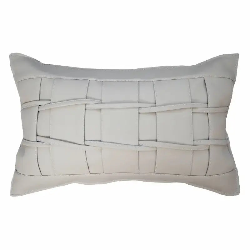 Rectangular off-white leather pillow with woven strap detail complementing decorbites gray faux rex rabbit fur cushion cover
