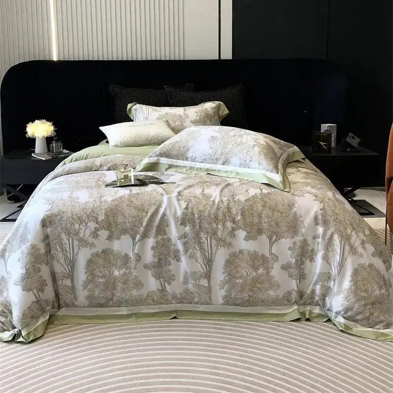 Elegant ivory and sage green satin bedding set with tree-patterned jungle print flowers and subtle sheen from decorbites