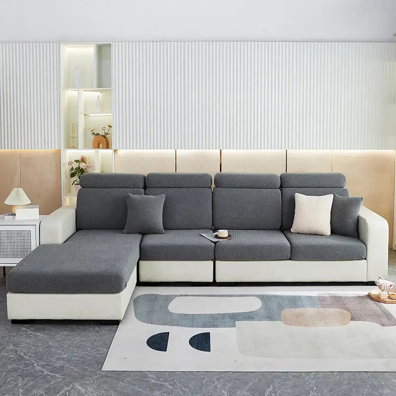 Modern l-shaped sectional sofa with white frame and gray decorbites jacquard velvet sofa cover and contrasting pillows