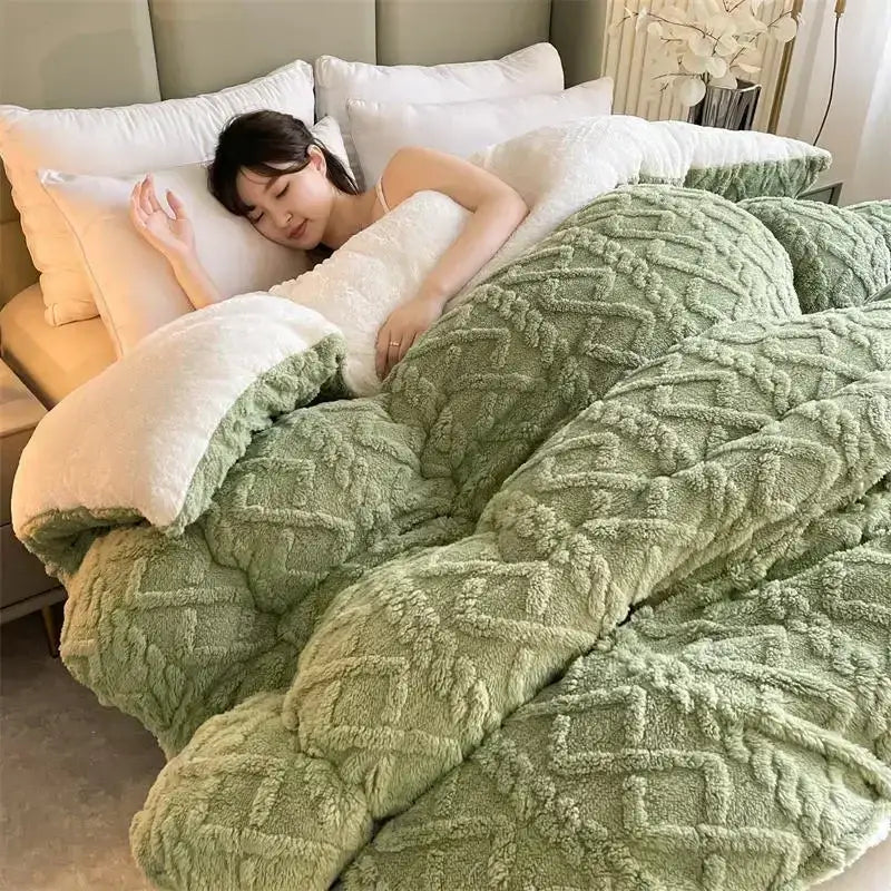 Soft mint green plush quilt with diamond texture and white fleece lining perfect for decorbites cozy winter bed blanket
