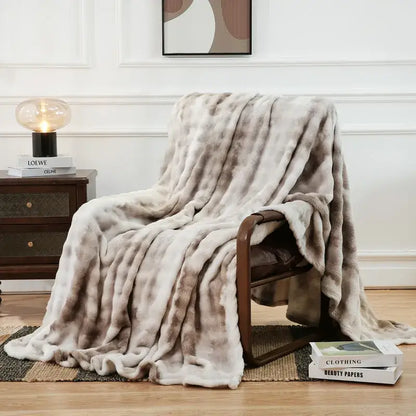 A soft beige and gray mottled fuzzy faux fur blanket decorbites fuzzy faux bedroom throw for cozy decor