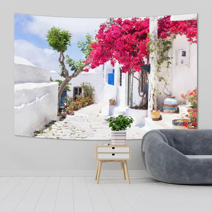 Greece town scenery tapestry sofa blanket featuring white and blue mediterranean alleyway with pink bougainvillea blooms