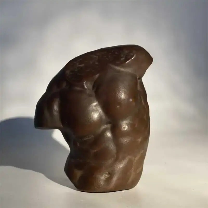 Bronze-colored greek nude human figure bust sculpture featuring a muscular torso for living room decor