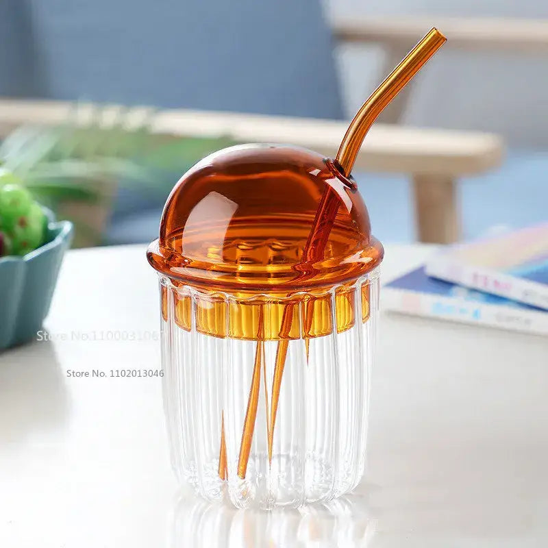 Green decorbites 450ml striped glass cup with clear ridges, amber translucent dome lid, and matching curved straw