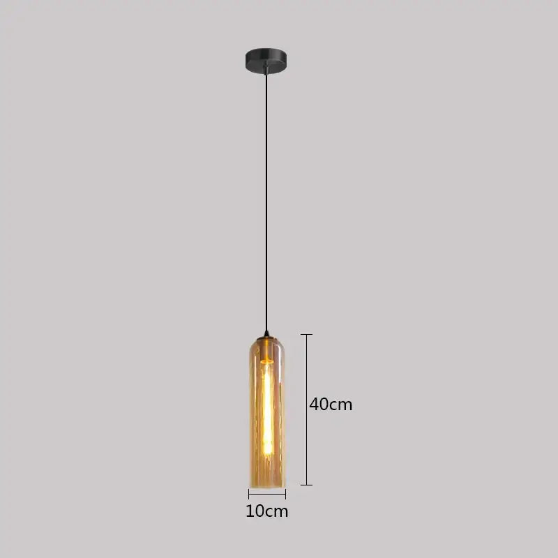 A sleek 40cm tall green glass nordic pendant light with warm amber shade and black metal hardware for living room
