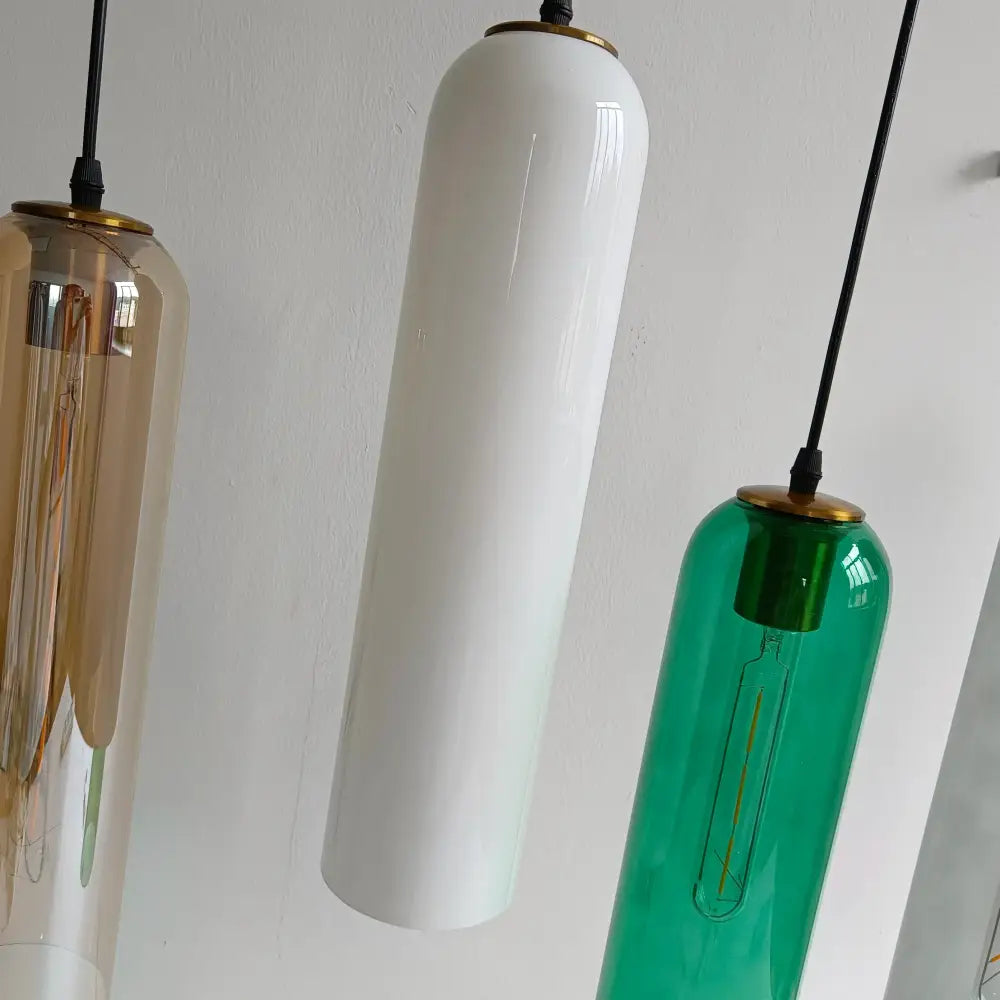 White cylindrical glass nordic pendant light with gold metal top and black cord for living room lighting
