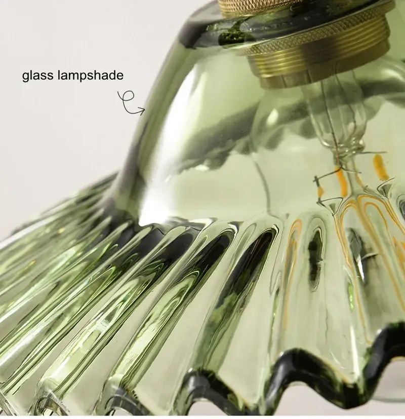 Green and clear glass pendant light with translucent ribbed lampshade and decorbites copper base fittings