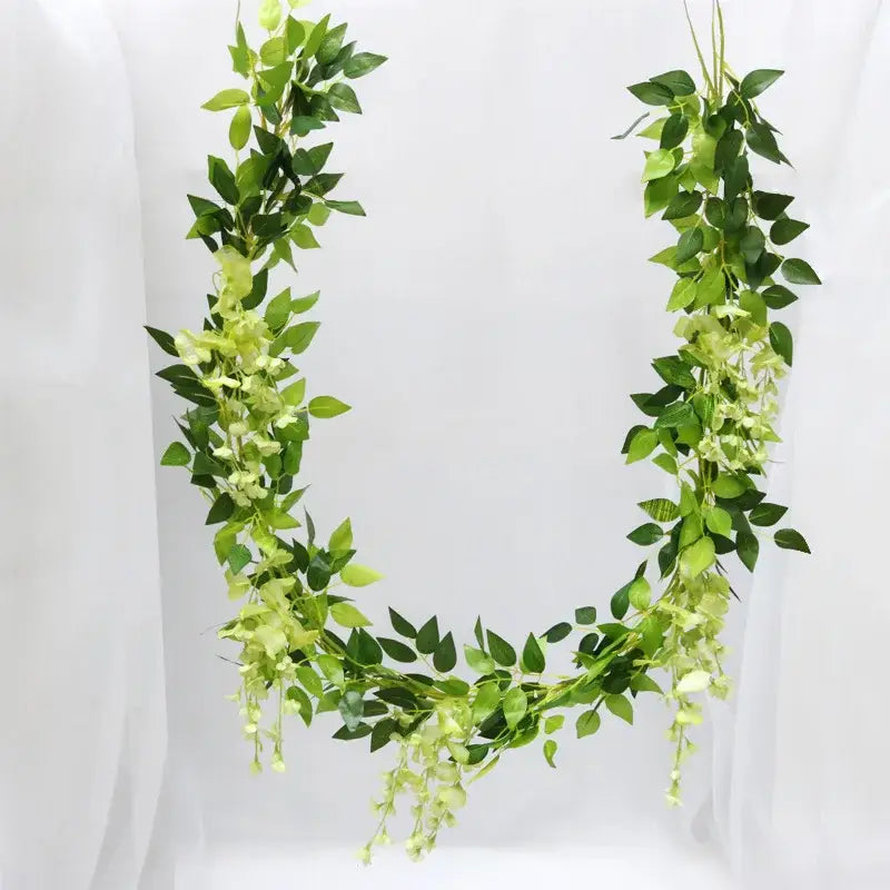 Green and white artificial flowers garden wedding arch decor featuring lush decorbites artificial flowers vine garland