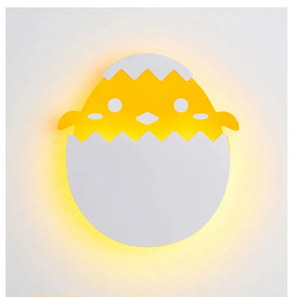 A charming yellow and white chick wall lamp with soft glow featured as decorbites dino egg led bedroom night light