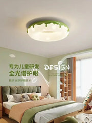 Green and white decorbites doughnut ceiling light with playful dripping icing design for bedroom eye protection led lighting