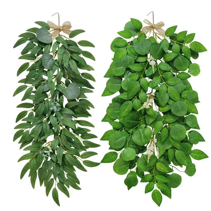 Two green eucalyptus artificial flower garlands with beige ribbon bows for wedding decor by decorbites eucalyptus artificial