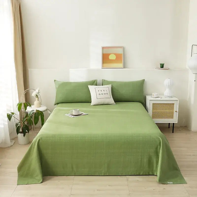 A soft sage green woven bedspread featured in decorbites cartoon printed cotton bedspread for bedroom decor