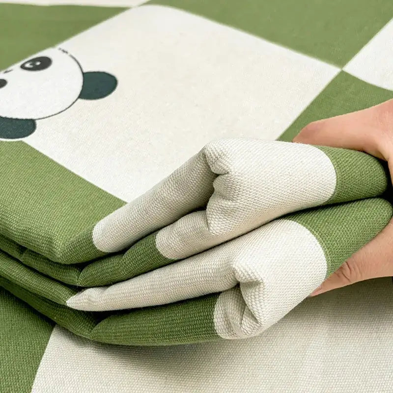 Green and white panda cartoon printed cotton bedspread featuring a soft checkered fabric mat for bedroom decorbites decor