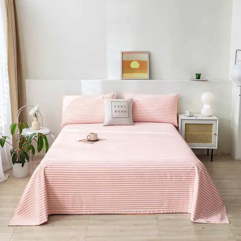 Pink and white striped satin finish bed sheet shown with green and white panda cartoon printed cotton bedspread decorbites cartoon printed