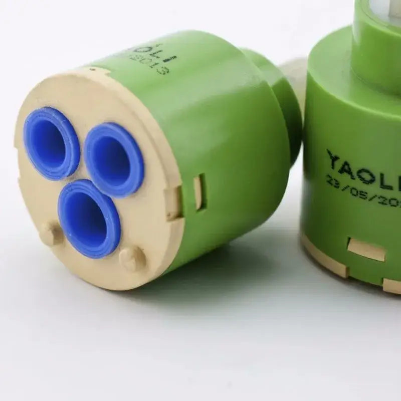 Green and beige ceramic cartridge with three blue inlets for kitchen faucet mixer with 3-year warranty ceramic cartridge