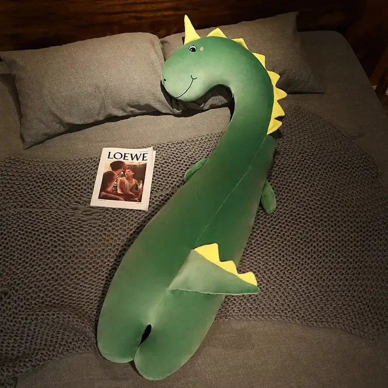 A plush green and yellow dinosaur cartoon animal body pillow with smiling face for decorbites cartoon animal bedroom decor