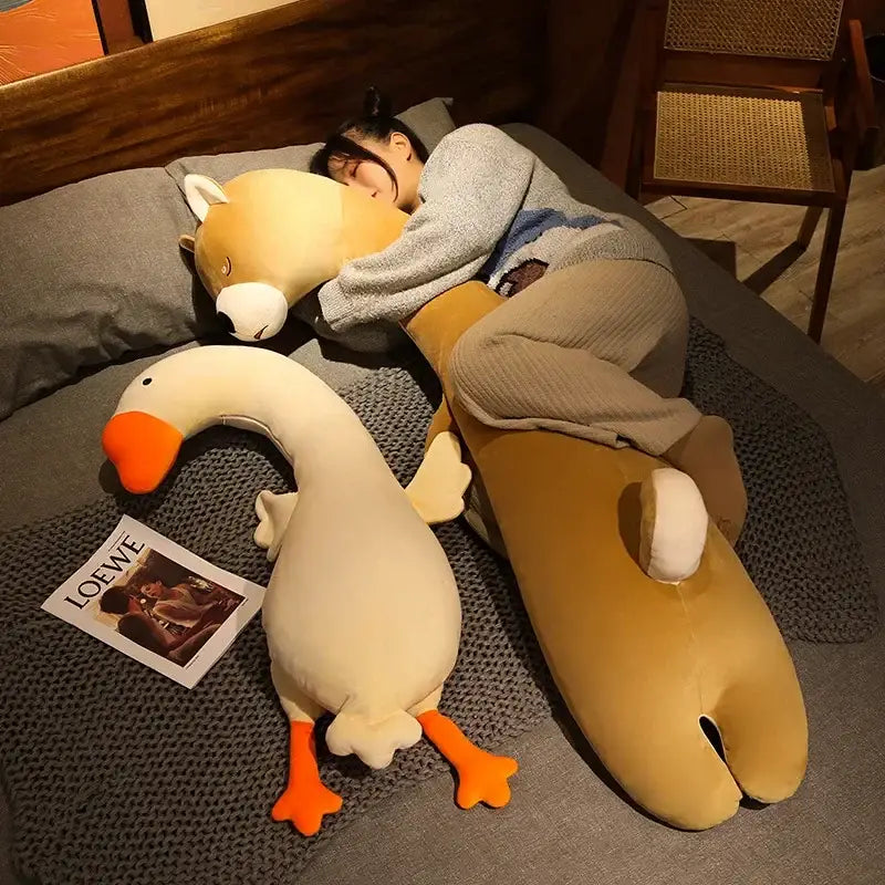 Cream-colored plush cartoon animal body pillow with orange beak and feet soft fabric decorbites cartoon animal decor