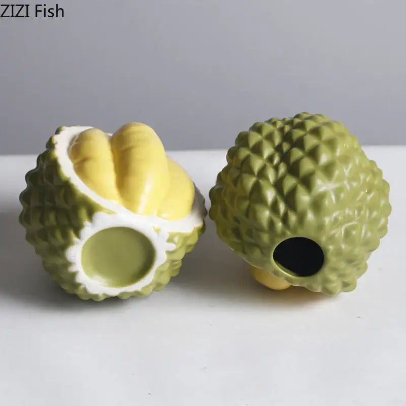 Green and yellow durian ceramic vase set featuring durian ceramic figurines with open flesh for living room table decor