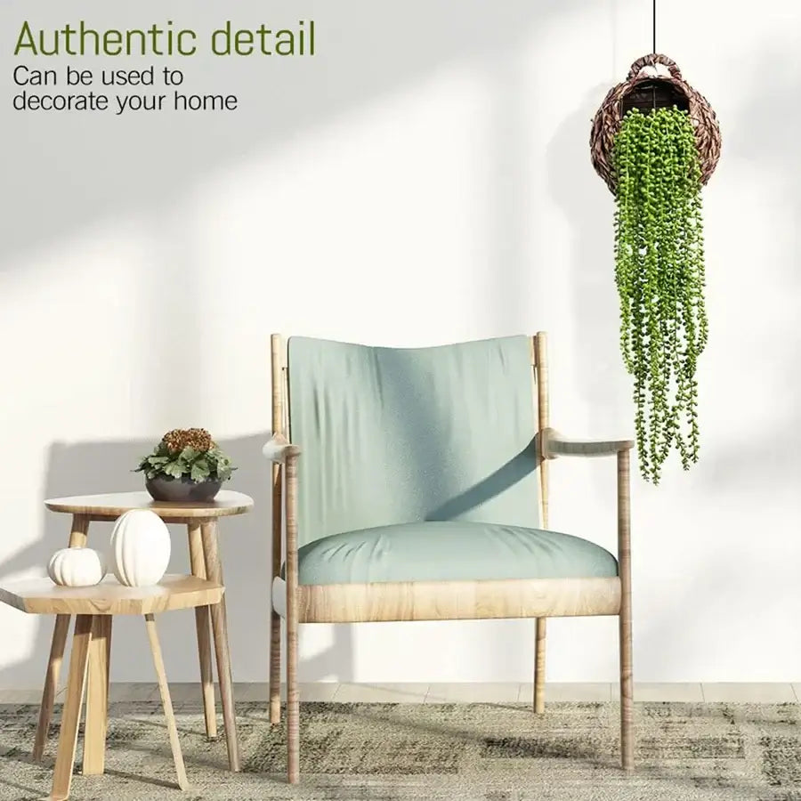 Light blue upholstered armchair with wooden frame next to green artificial fern vine for living room decor