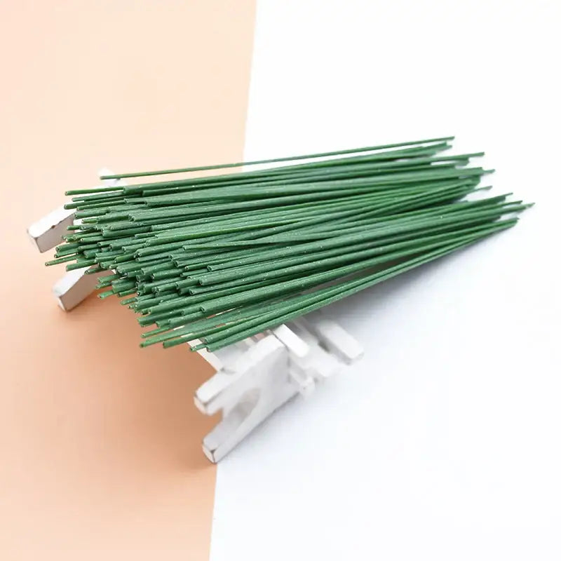A bundle of green decorbites iron wire roses stems made of iron wire for artificial flowers wedding decor