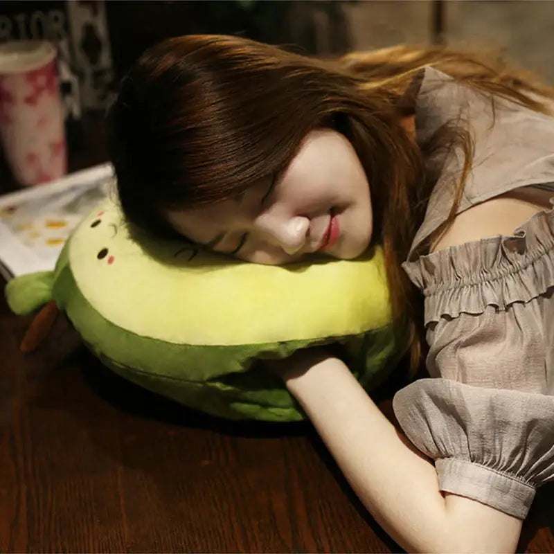 Soft green avocado cartoon animal throw pillow blanket with embroidered face and stem detail for bedroom decorbites decor