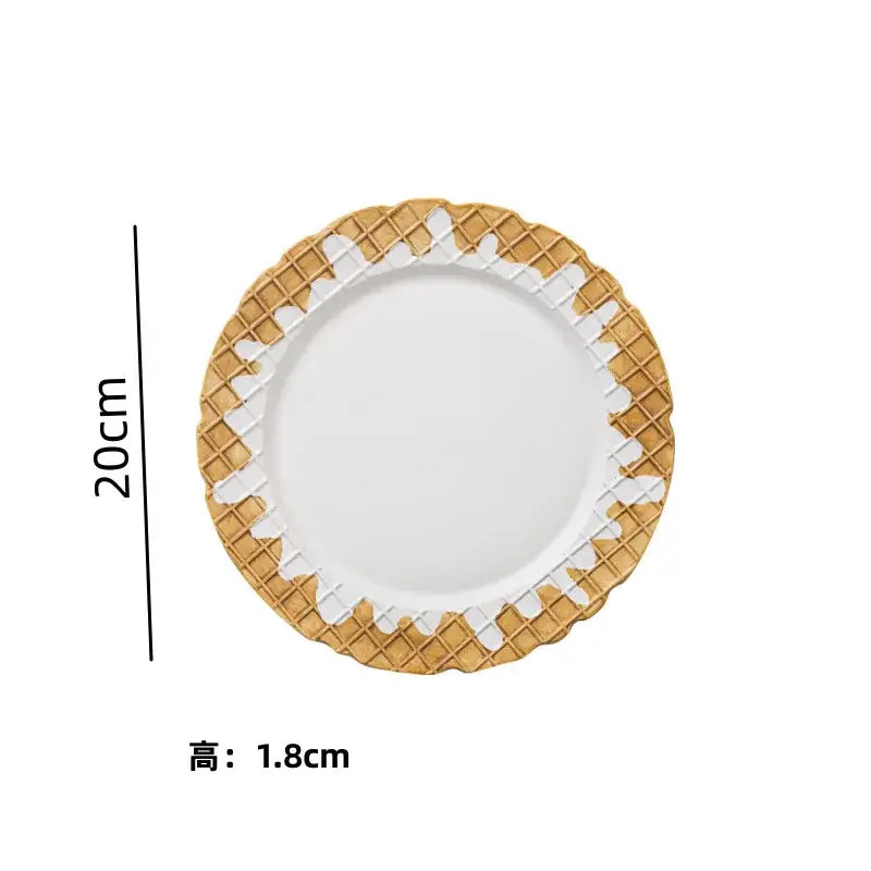 White ceramic plate with golden waffle-patterned rim and decorative icing from decorbites creative biscuit ceramic tableware set