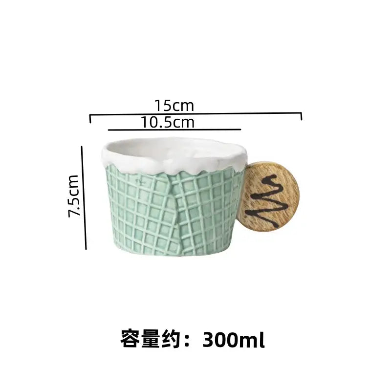 A mint green creative biscuit ceramic planter shaped like a waffle cone with a white rim and wooden handle