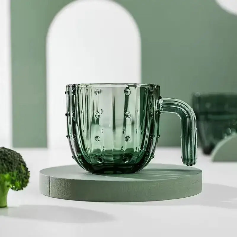 Translucent green glass mug shaped like a cactus with textured ridges and bumps decorbites cactus glass mug